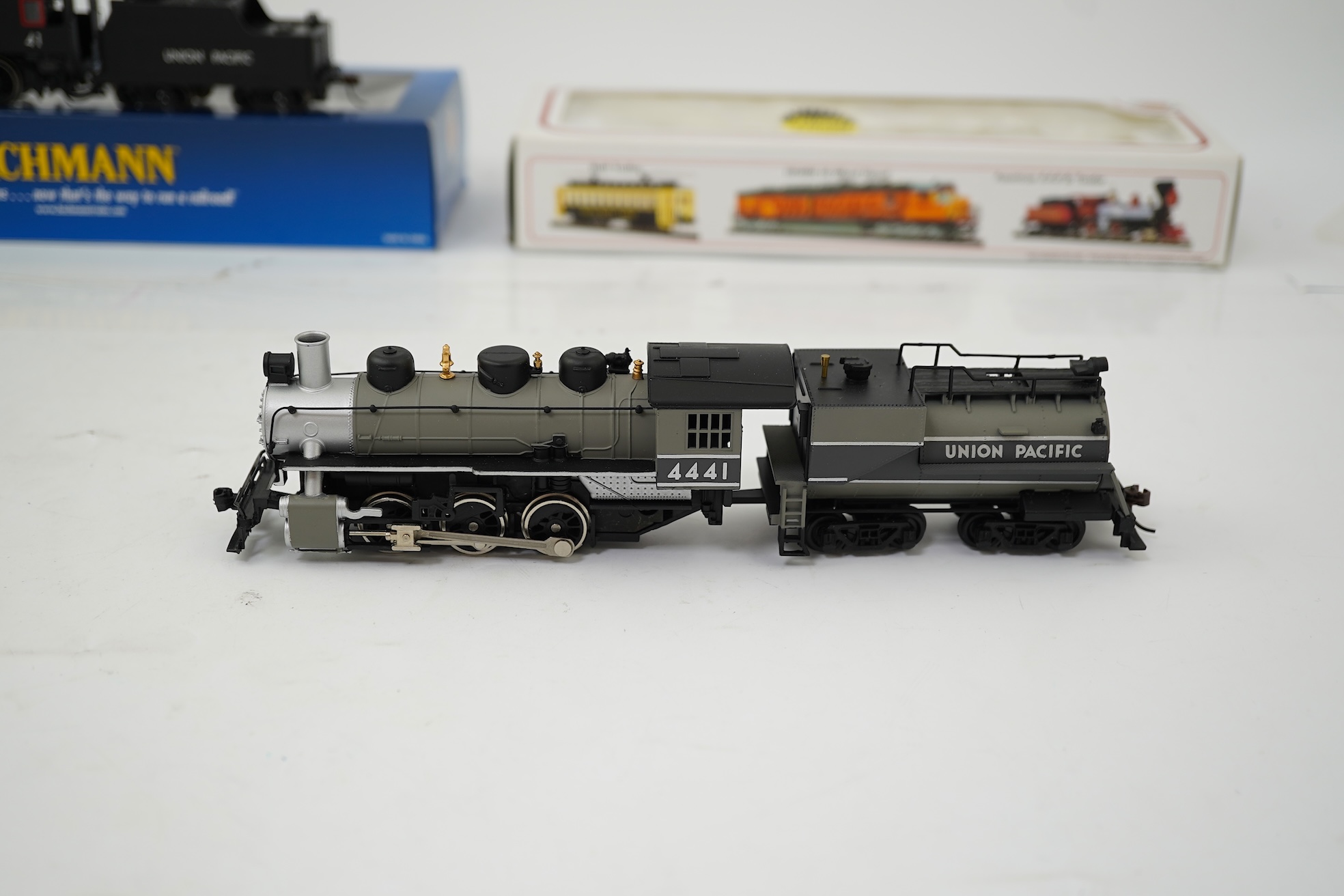 Three boxed HO gauge Bachmann Union Pacific locomotives; (51705) model of ALCO, 41, 2-6-0 locomotive with bogie tender, together with (51501) model of Prairie, 1836, 2-6-2 locomotive with bogie tender, and (50701) model